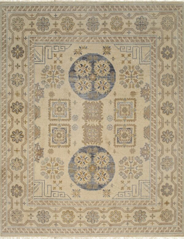 Cream-colored rug with two large blue medallions and geometric patterns in tan and soft blue.