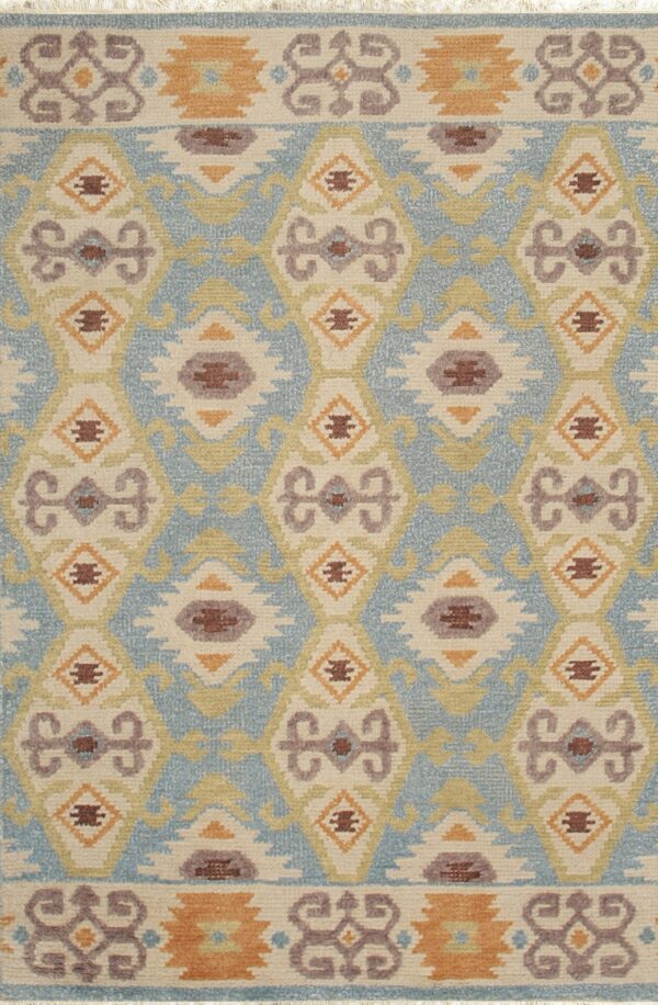 Low pile rug in light blue, cream, and earthy colors, featuring a detailed southwestern geometric pattern.