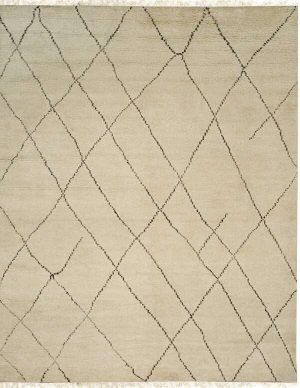 A high-pile beige rug with a dark, irregular diamond grid pattern and white fringe.