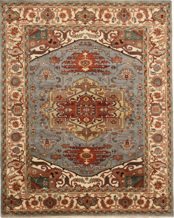 Traditional rug with a slate blue field, rust red medallion, and ivory borders displaying floral motifs.