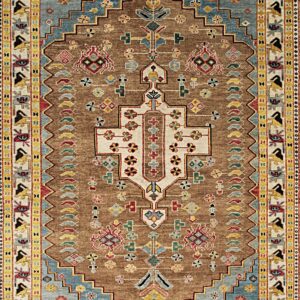 Brown and blue rug with a stepped central medallion and colorful geometric tribal motifs.