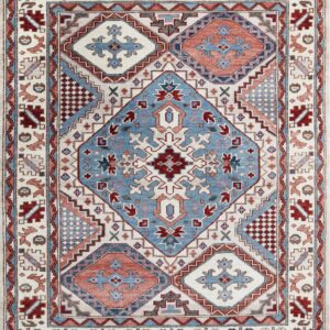 Geometric rug with an ivory field, featuring blue, terracotta, and deep red traditional patterns.
