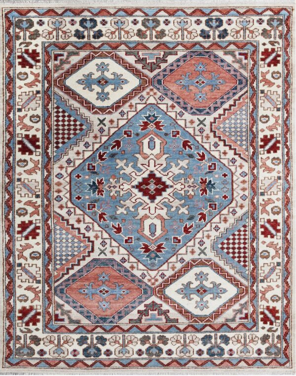 Geometric rug with an ivory field, featuring blue, terracotta, and deep red traditional patterns.