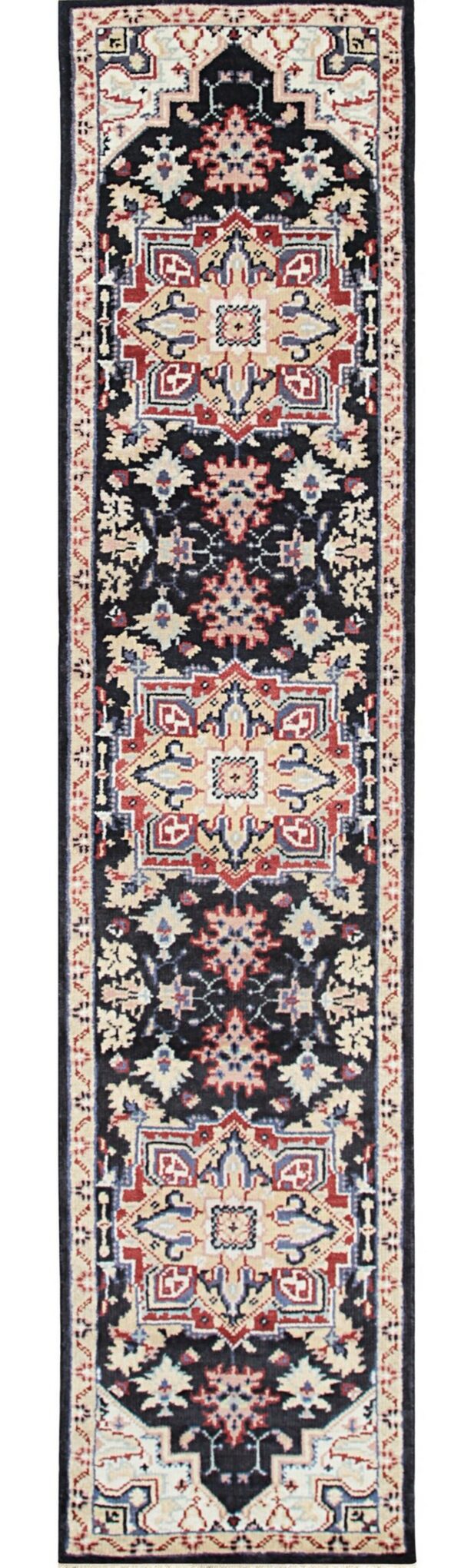 Traditional runner rug with a dark navy field and central medallion design in red, cream, and blue.