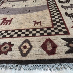 Textured beige rug featuring brown and burgundy stripes, stylized animals, and a checkered main border.