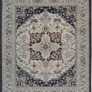 Traditional medallion rug design in cream, dark navy, gray, and red with visible fringe.