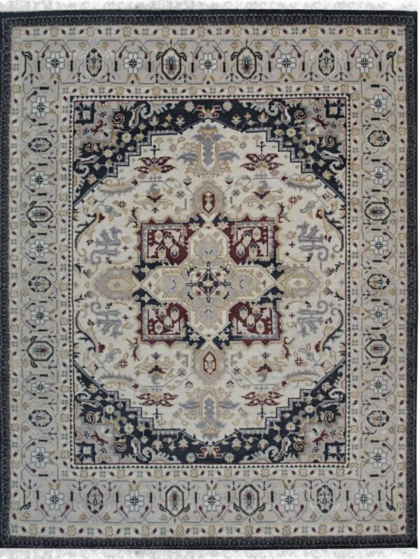 Traditional medallion rug design in cream, dark navy, gray, and red with visible fringe.