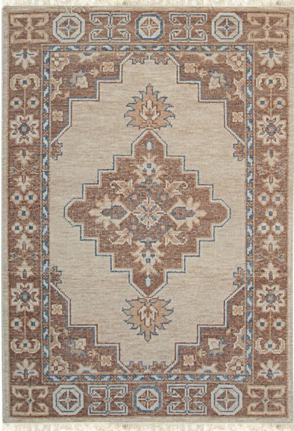 Traditional beige and brown geometric rug featuring a center medallion and blue and tan accents.