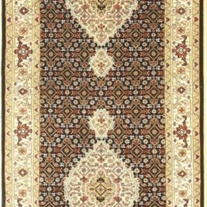 Brown and cream traditional runner rug with repeating geometric designs and decorative borders.
