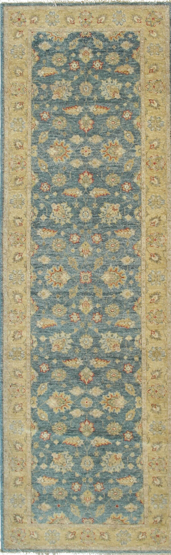 Muted blue runner rug with a traditional repeating floral pattern and wide tan borders.