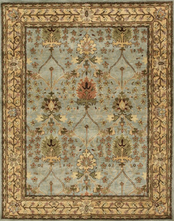 Pale blue-green traditional rug with an elaborate floral design and gold, olive, and terracotta accents.