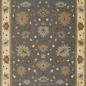 Dark gray rug with a cream border features an ornate floral pattern in tan, brown, and light blue.