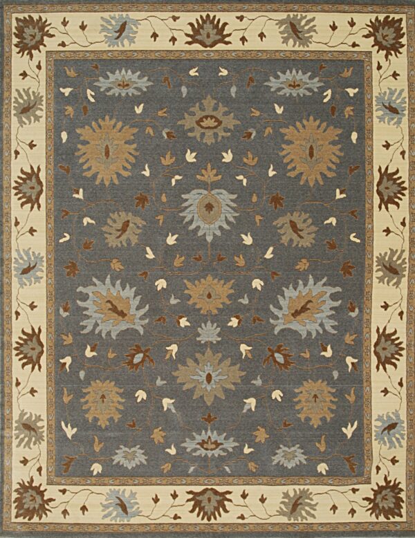 Dark gray rug with a cream border features an ornate floral pattern in tan, brown, and light blue.