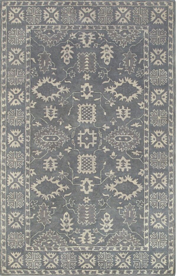 Slate blue rug with cream traditional geometric and stylized floral motifs and layered borders.