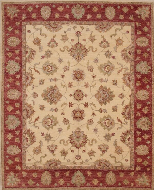Traditional rug with a cream field and maroon borders featuring ornate floral motifs.