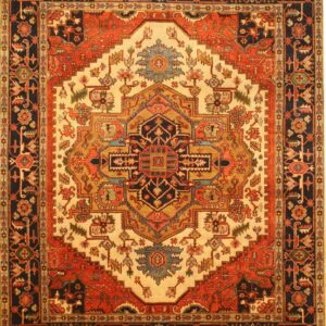 Square rug with a traditional medallion pattern in navy, rust, gold, teal, and cream colors.