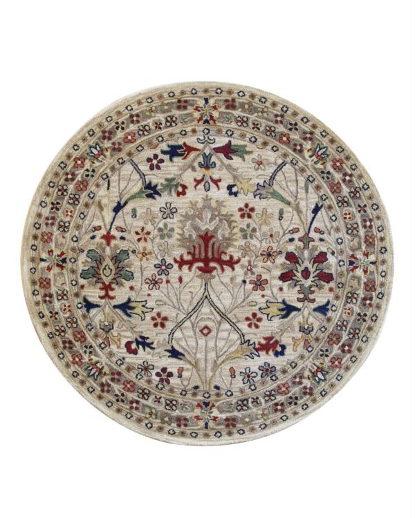 Traditional round rug with a dense multicolored floral design on a light beige background.