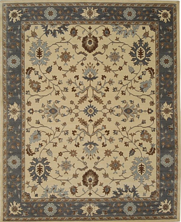 Rectangular rug displaying an all-over floral pattern in blue, brown, and cream with a gray border.