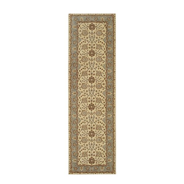 Beige runner rug with detailed traditional brown and dusty blue floral border and central pattern.