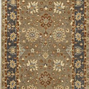Traditional floral runner rug with a gray-brown field and borders in dark blue, tan, and rust.