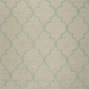 Textured beige rug featuring a repeating light blue geometric quatrefoil pattern.