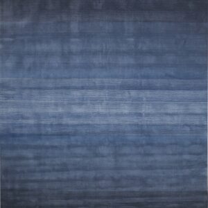 Low-pile blue rug featuring horizontal stripes and a visible color gradient.