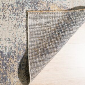 The abstract cream and gray rug is folded back, revealing the woven backing on light wood flooring.