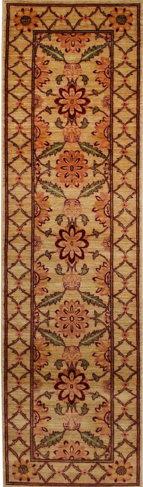 Traditional tan runner rug featuring large red and pink floral motifs and a diamond lattice border.