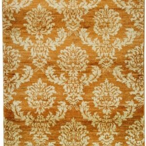 Runner rug with large repeating cream floral medallions on a variegated rust colored ground.