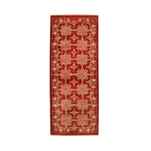 Red and gold runner rug with repeating central star-like motifs and decorative borders against a white background.