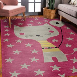 A pink area rug featuring a large gray cat and stars lies on hardwood floors between a pink chair and a gray sofa.