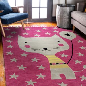 Pink rug with a graphic cat and stars on wood flooring, next to a blue chair and gray sofa.