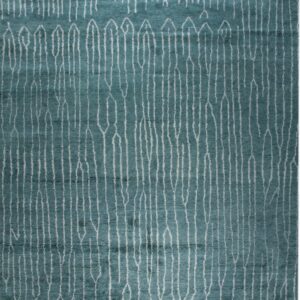 Teal area rug with a dense white pattern of long, vertical, abstract lines and shapes.