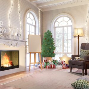 A muted, distressed pale pink rug sits on wood floors in a warmly lit holiday living room scene.
