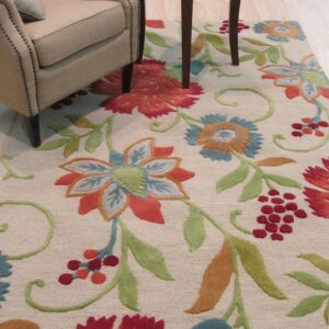 Textured beige rug with large red, green, and blue floral motifs beneath a beige chair and dark side table.