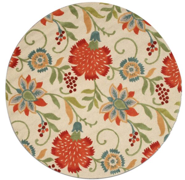 Circular rug displaying a large floral pattern on a cream background with red, green, orange, and teal elements.