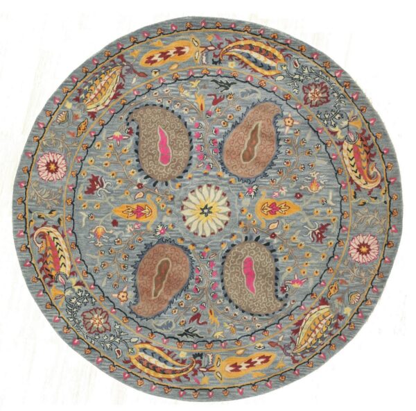 Circular blue-gray rug with a detailed multicolored botanical and paisley medallion design.