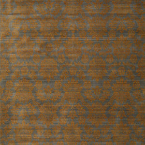 Charcoal grey rug featuring a distressed saffron floral pattern on a striated, low-pile background.