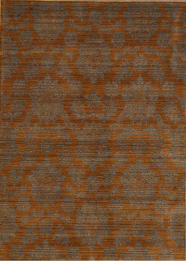 Rust and slate blue rug featuring a repeating damask pattern with visible horizontal texture and striations.