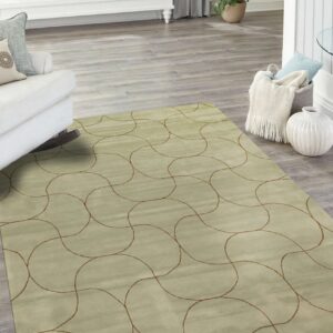 Muted green low-pile rug with thin brown abstract curve pattern resting on gray wood plank flooring.