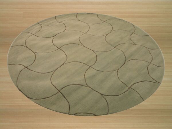 Plush, round taupe rug featuring an interlocking brown line design on natural wood flooring.