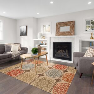 Beige rug featuring rows of colorful red, blue, and orange medallion patterns on dark wood living room floors.