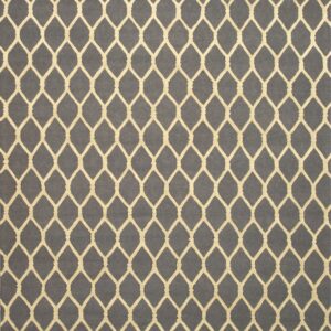 Dark gray textured rug with a raised beige geometric lattice pattern.