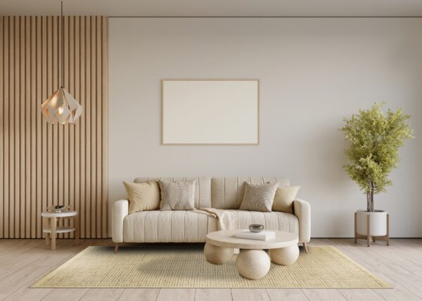 Textured natural rug featuring a woven diagonal pattern anchors a modern living room setting.