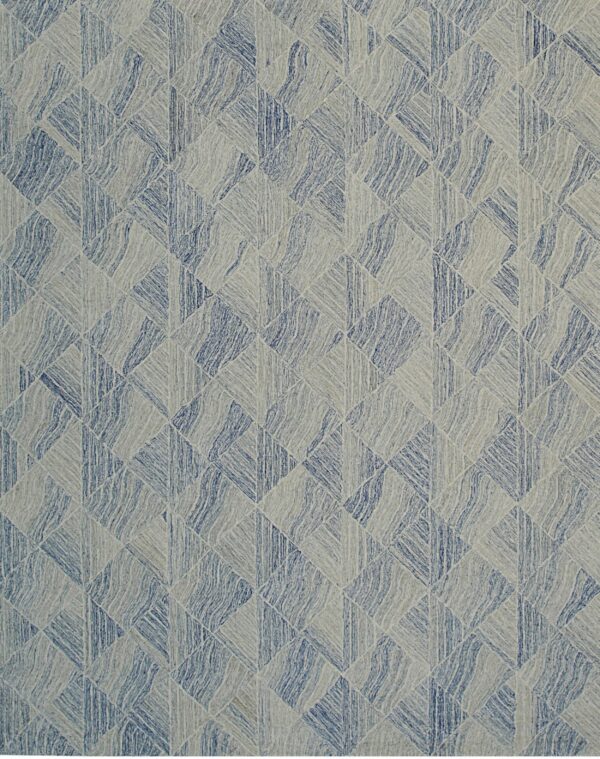 Textured rug featuring a repeating geometric diamond pattern in variegated blue and light gray tones.