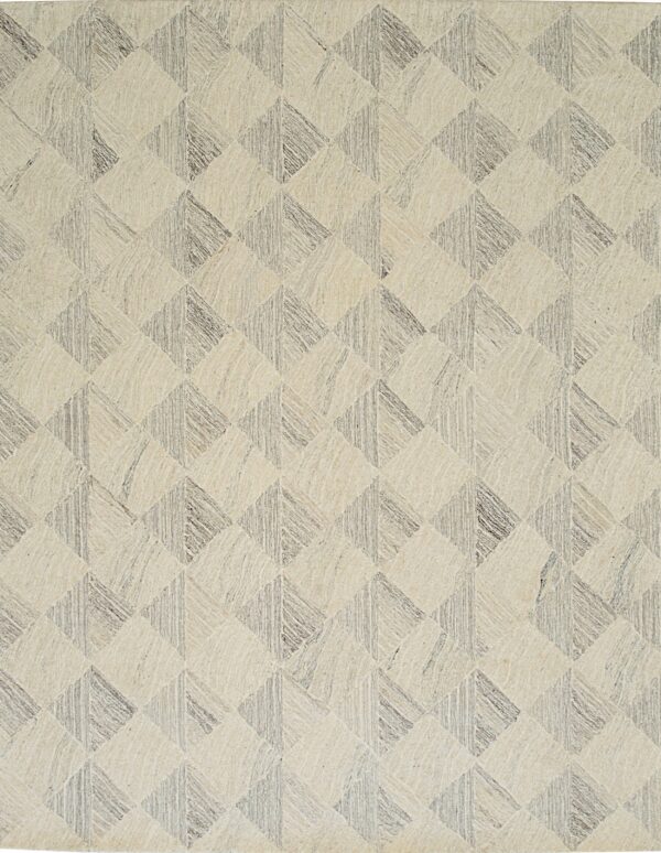 A textured rug with an interlocking geometric pattern in cream and gray tones.