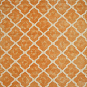 Textured, high-pile orange rug with a cream geometric trellis pattern and subtle color variations within the motifs.