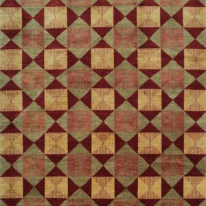 A repeating geometric rug pattern in red, olive green, and alternating striped yellow and pink squares.