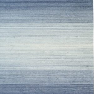 Textured blue rug featuring a horizontal ombre pattern that fades from dark blue to light blue in the center.