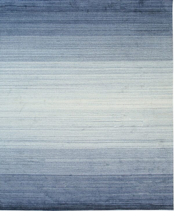 Textured blue rug featuring a horizontal ombre pattern that fades from dark blue to light blue in the center.